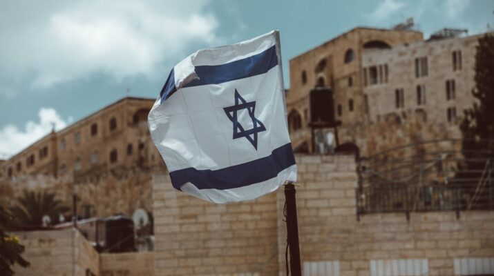 blue and white flag on pole