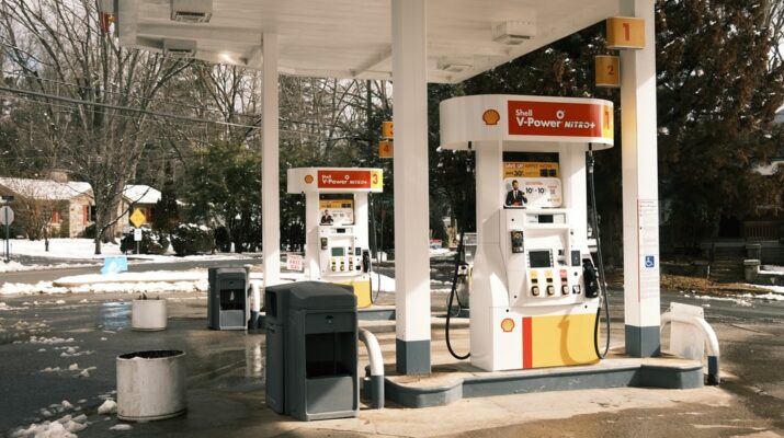 white gas pump near white gas pump