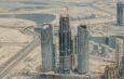a large group of tall buildings under construction