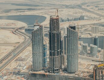 a large group of tall buildings under construction